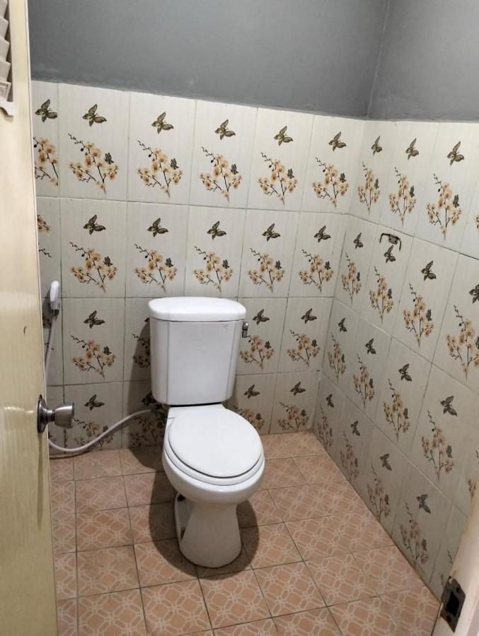 T&T Homestay Kuta  Luaran gambar