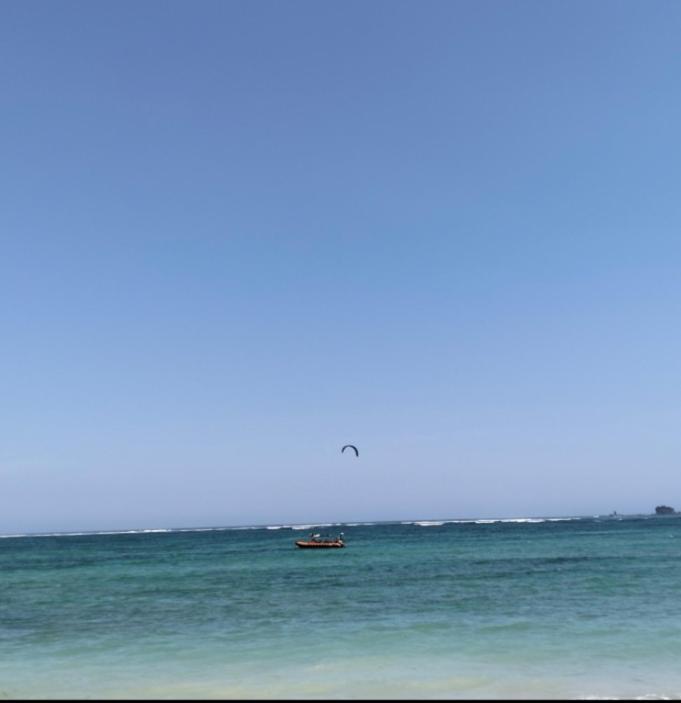 T&T Homestay Kuta  Luaran gambar
